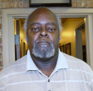 Private investigator in Houston standing indoors for a professional photo
