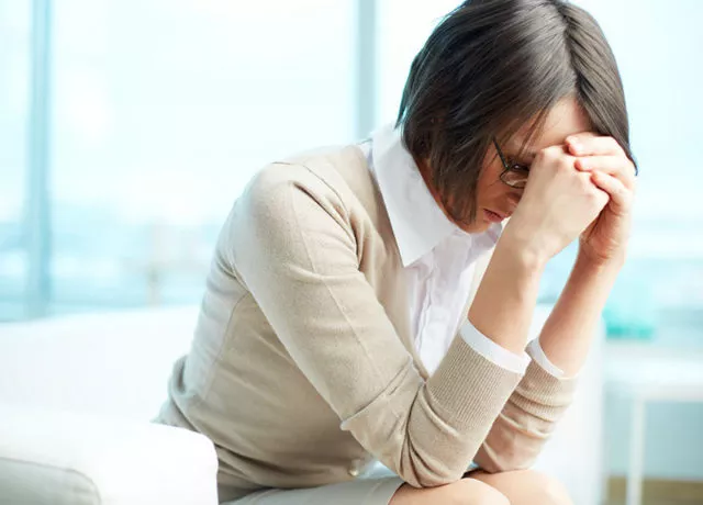 Worried woman overwhelmed by marital infidelity, seeking answers through investigation support
