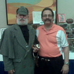 Private investigator event with attendee in Sherlock Holmes costume posing for photo